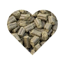 Et billede af Brogaarden Optimal Treats i en bunke. Billedet er formet som et hjerte